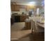 Functional kitchen with wooden cabinets and essential appliances at 6226 W Citrus Way, Glendale, AZ 85301
