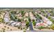 Expansive aerial view of a residential neighborhood showcasing well-maintained homes and lush landscaping with mature trees at 6597 N 79Th Pl, Scottsdale, AZ 85250