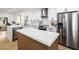 Modern kitchen featuring stainless steel appliances, island with countertop, and lots of counter space at 6597 N 79Th Pl, Scottsdale, AZ 85250