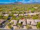 A beautiful mountain community with well-maintained landscaping, tile roof homes and open space at 6996 E Mighty Saguaro Way, Scottsdale, AZ 85266