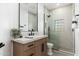 Sleek bathroom showcasing a glass shower, a modern vanity, and elegant neutral tones at 6996 E Mighty Saguaro Way, Scottsdale, AZ 85266