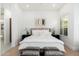 Primary bedroom showcases a comfortable bed, neutral tones, and natural light at 6996 E Mighty Saguaro Way, Scottsdale, AZ 85266