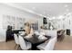 Open concept layout with dining area adjacent to the kitchen island at 6996 E Mighty Saguaro Way, Scottsdale, AZ 85266