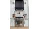 Modern kitchen features stainless steel range, sleek black vent hood, and stylish white cabinets at 6996 E Mighty Saguaro Way, Scottsdale, AZ 85266