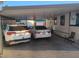 Attached carport providing covered parking for two vehicles with additional storage at 701 S Dobson Rd # 438, Mesa, AZ 85202
