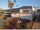 Quaint single-story residence featuring covered parking and a nicely landscaped front yard at 701 S Dobson Rd # 438, Mesa, AZ 85202
