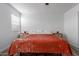 Bright bedroom featuring neutral walls and an inviting bed with side tables at 7064 W Lincoln St, Peoria, AZ 85345