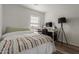 Bright bedroom featuring a desk, chair, and lamp setup for a functional workspace at 7064 W Lincoln St, Peoria, AZ 85345
