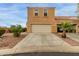 Inviting two-story townhome featuring attached two-car garage and well-maintained desert landscaping at 7064 W Lincoln St, Peoria, AZ 85345