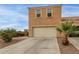 Inviting two-story townhome featuring attached two-car garage and well-maintained desert landscaping at 7064 W Lincoln St, Peoria, AZ 85345