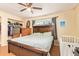 Comfortable main bedroom showcases closet and wood-look floors at 7114 W Oregon Ave, Glendale, AZ 85303
