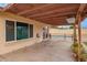 Covered patio with view of backyard pool and exterior at 7114 W Oregon Ave, Glendale, AZ 85303