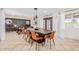 Stylish dining area open to the game room, featuring a large table and trendy decor at 7308 E Diamond St, Scottsdale, AZ 85257
