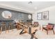 Entertainment room featuring a foosball table, stylish bar, and a fun, modern design at 7308 E Diamond St, Scottsdale, AZ 85257