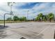 Community basketball court with hoops and painted lines for recreational games and activities at 7308 S 29Th Ln, Phoenix, AZ 85041