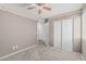 Simple bedroom featuring neutral walls, carpet, and closet at 7308 S 29Th Ln, Phoenix, AZ 85041