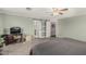 Relaxing main bedroom features carpet, neutral paint, and a private en suite bathroom at 7308 S 29Th Ln, Phoenix, AZ 85041