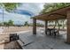 Community play area with covered picnic tables, playground, and sand volleyball court at 7308 S 29Th Ln, Phoenix, AZ 85041