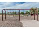 Community playground with swings in a park area, providing outdoor activity and a place for children to play at 7308 S 29Th Ln, Phoenix, AZ 85041