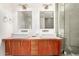 Modern bathroom showcasing a glass shower enclosure and dual sinks at 8314 E Vista Dr, Scottsdale, AZ 85250