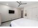Clean bedroom with white walls and gray carpet flooring, with sliding closet doors at 8314 E Vista Dr, Scottsdale, AZ 85250