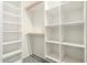 Walk-in closet with built-in shelving and ample storage space at 8314 E Vista Dr, Scottsdale, AZ 85250