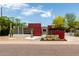 Unique home boasts drought-tolerant landscaping, red siding accents, and plenty of curb appeal at 8314 E Vista Dr, Scottsdale, AZ 85250