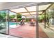 Inviting outdoor patio with a dining table, a canvas cover, and a view of the pool at 8314 E Vista Dr, Scottsdale, AZ 85250