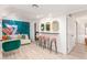 Eclectic living room with lounge area, bar seating, and colorful decor at 8437 E Bonnie Rose Ave, Scottsdale, AZ 85250