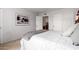 Comfortable bedroom featuring a bed, natural lighting, and closet storage at 8500 E Indian School Rd # 233, Scottsdale, AZ 85251