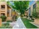 Well-maintained community featuring lush landscaping, mature trees, and inviting walkways at 8500 E Indian School Rd # 233, Scottsdale, AZ 85251