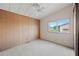 Bedroom with natural lighting, neutral carpet, and closet at 8600 E Broadway Rd # 30, Mesa, AZ 85208
