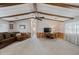 Spacious living room features neutral carpets, wood accents, and plenty of natural light at 8600 E Broadway Rd # 30, Mesa, AZ 85208