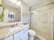 Updated bathroom features granite counters, walk-in shower with glass doors at 8728 E Monte Vista Rd, Scottsdale, AZ 85257
