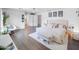 Sun-filled main bedroom featuring plush bed, bench, and soft decor elements at 8728 E Monte Vista Rd, Scottsdale, AZ 85257