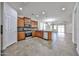 Modern kitchen features stainless steel appliances, granite countertops, and tile backsplash at 9072 W Myrtle Ave, Glendale, AZ 85305