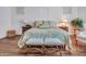 Well-lit bedroom showcasing a comfortable bed and coordinated décor at 9157 W Country Club Trl, Peoria, AZ 85383