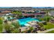 Relax poolside in this community gathering spot, shaded by sails and offering seating, with convenient ramada and restroom access at 9157 W Country Club Trl, Peoria, AZ 85383