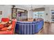 Cozy living room with comfortable seating and built-in media center, perfect for relaxation at 9157 W Country Club Trl, Peoria, AZ 85383