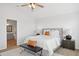 Comfortable bedroom featuring ensuite bathroom and ceiling fan at 10109 E Trailhead Ct, Gold Canyon, AZ 85118