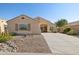 Charming single-story home with desert landscaping and a welcoming front porch at 10109 E Trailhead Ct, Gold Canyon, AZ 85118