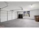Spacious garage with an automatic door, a window and plenty of room for storage or parking your vehicles at 10109 E Trailhead Ct, Gold Canyon, AZ 85118