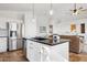 Kitchen island in an open floor plan features stainless appliances and a convenient layout at 10109 E Trailhead Ct, Gold Canyon, AZ 85118