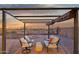 Charming outdoor seating area with desert views, perfect for enjoying the sunset at 10109 E Trailhead Ct, Gold Canyon, AZ 85118