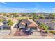 Charming single-Gathering home highlighting its landscaped front yard, enhancing its curb appeal within the residential area at 10305 E Plata Ave, Mesa, AZ 85212