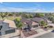 Scenic aerial view of a single-Gathering home showcasing a well-manicured front yard and attractive curb appeal at 10305 E Plata Ave, Mesa, AZ 85212