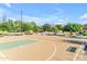 Well-maintained community basketball court with colorful surface and hoops, ideal for residents to enjoy outdoor sports at 10305 E Plata Ave, Mesa, AZ 85212