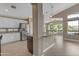 Well-lit kitchen showcases white cabinets, stainless steel appliances, and granite countertops, open to breakfast nook at 10305 E Plata Ave, Mesa, AZ 85212