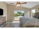 Bedroom with pool view offering a tranquil and scenic retreat at 10305 E Plata Ave, Mesa, AZ 85212