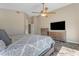 Bedroom with TV and backyard view, creating a cozy entertainment space at 10305 E Plata Ave, Mesa, AZ 85212
